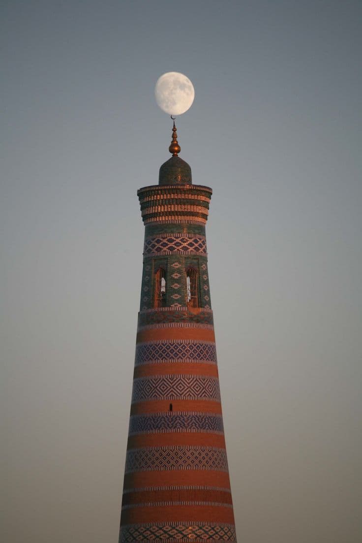 Minaret tower with moon